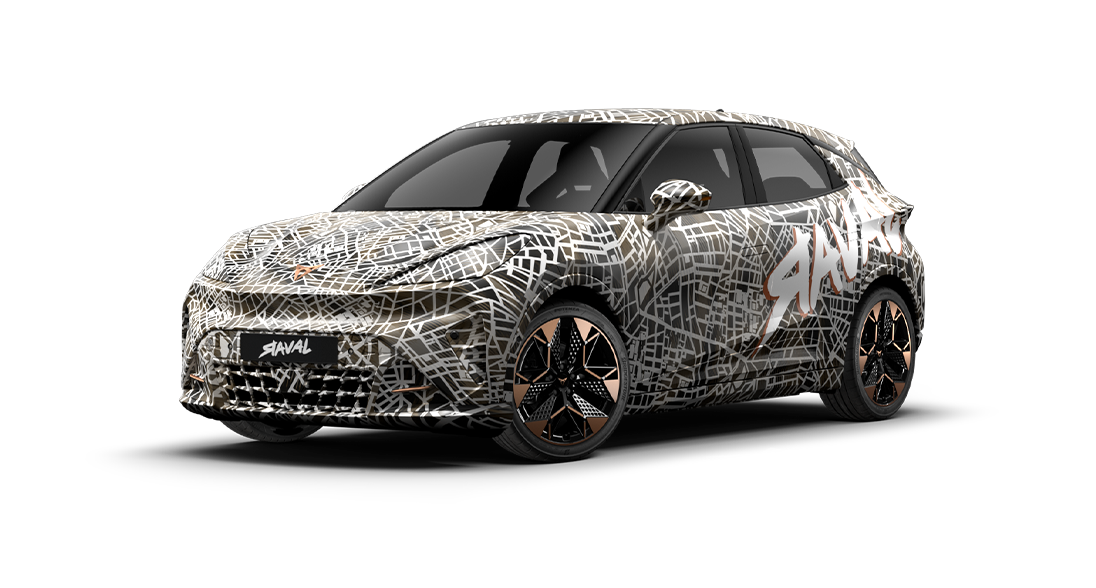 The CUPRA Raval Dynamic is shown from the front three-quarter view, covered in a black and white street map camouflage wrap. The car features black and copper-accented wheels and has the word "RAVAL" on the front grille.